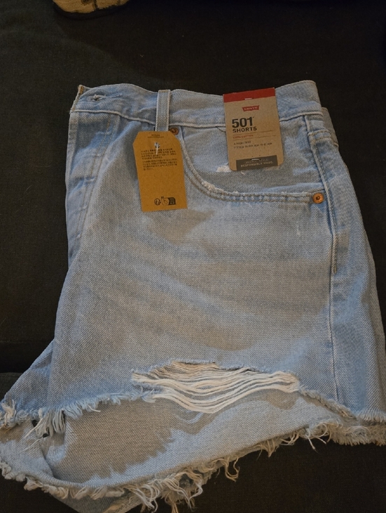 Levi's Pants - Levi's light blue distressed denim shorts with frayed hem
